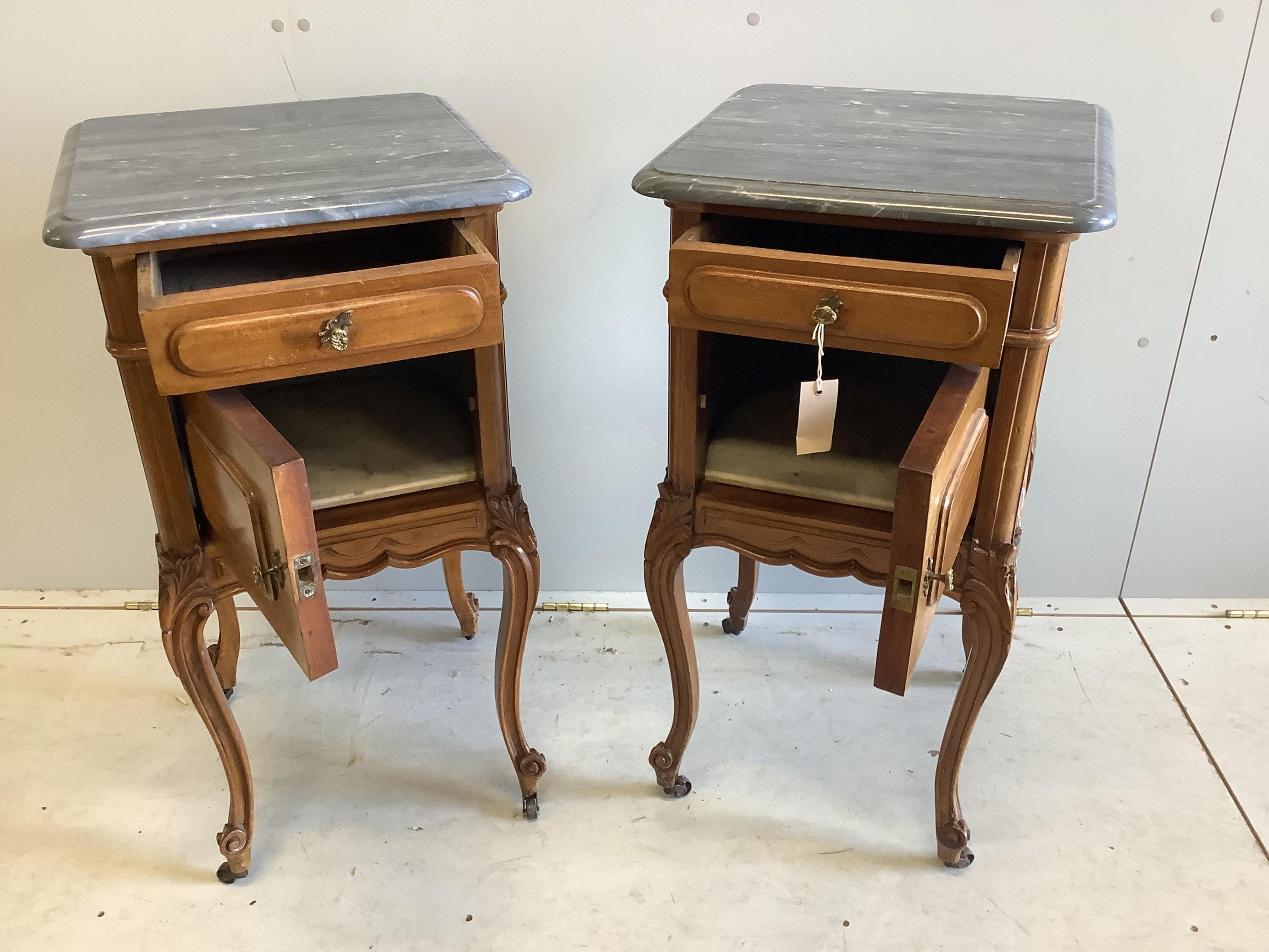 A pair of late 19th / early 20th century French mahogany marble top bedside cabinets, width 43cm, depth 43cm, height 83cm. Condition - good